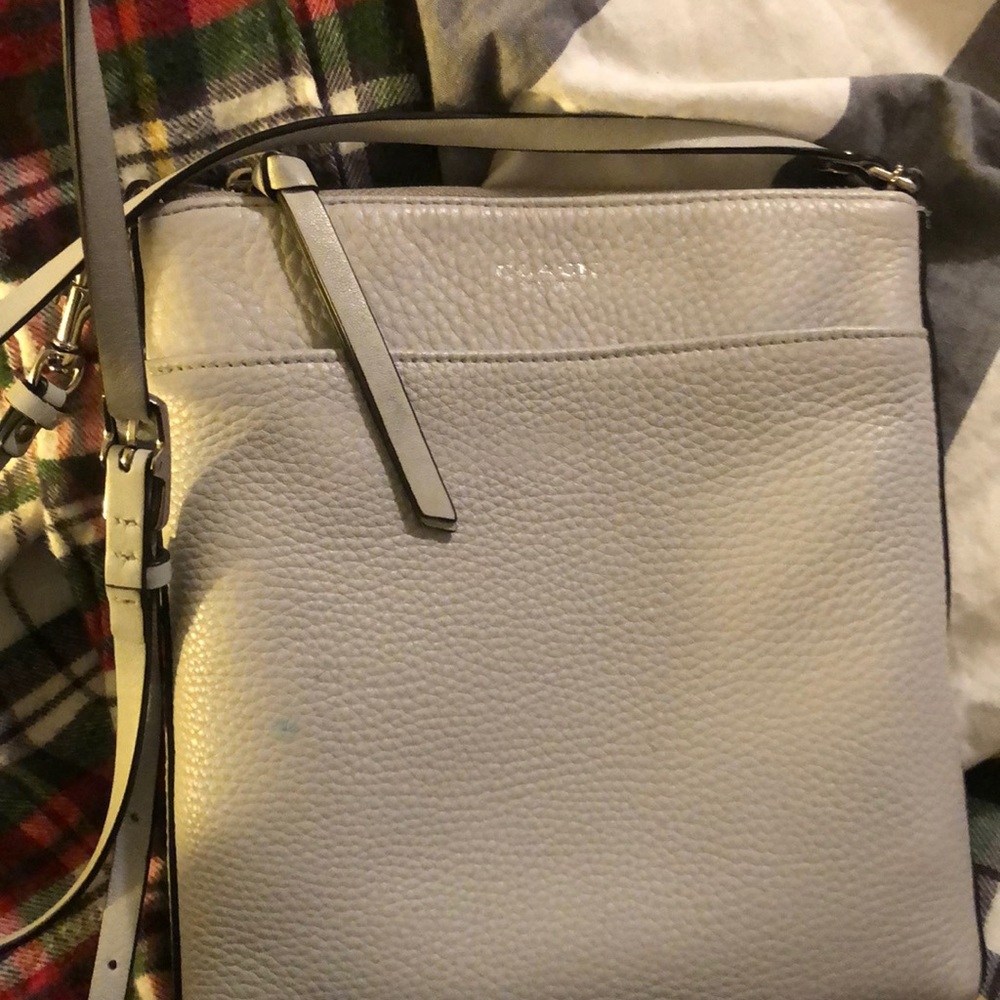 Crossover courier coach bag.